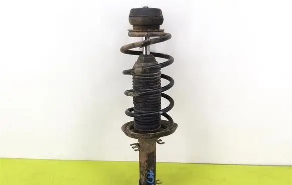 Volkswagen Golf IV Front shock absorber with coil spring