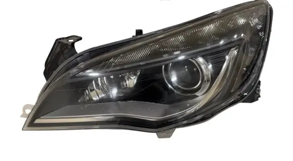 Opel Astra J Headlight/headlamp 13374517 1ZT01001205