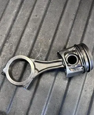 Piston with connecting rod