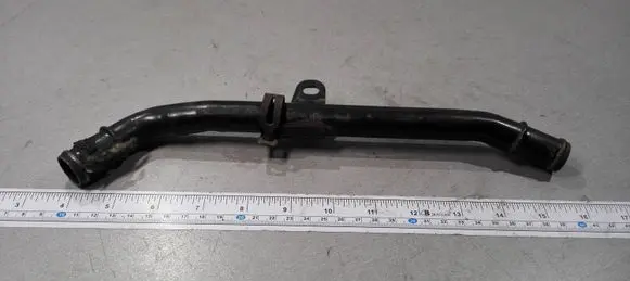 Volkswagen PASSAT B6 Engine coolant pipe/hose 06F121065J