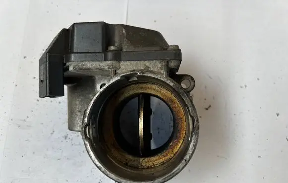 Volkswagen Touran I Throttle valve 03G128063G A2C53249824