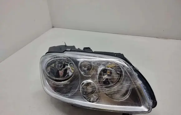 Volkswagen Touran I Headlight/headlamp 1T0941006D