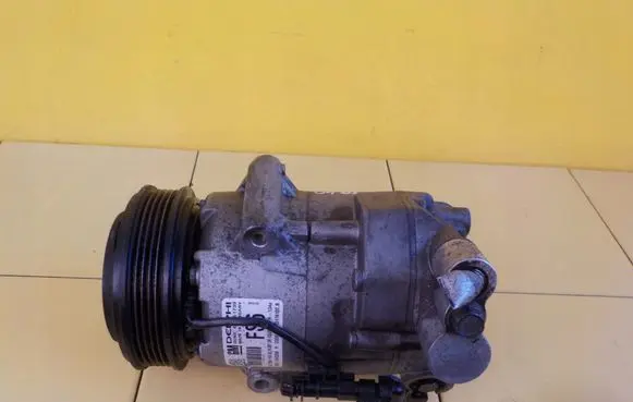 Opel Astra J Air conditioning (A/C) compressor (pump) 13412250