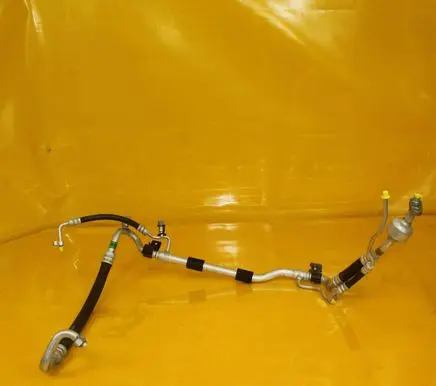 KIA Carens IV Air conditioning (A/C) pipe/hose 97775A4560