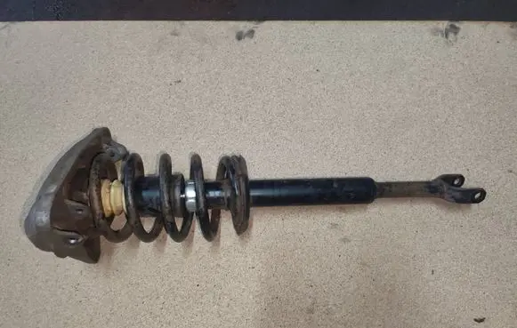 Front shock absorber with coil spring