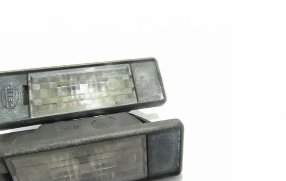 Peugeot 1007 Number plate light HELLA