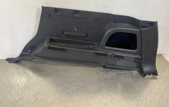 Trunk/boot lower side trim panel