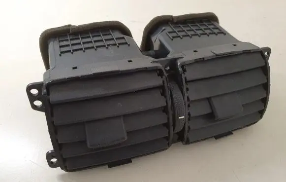 Hyundai Tucson JM Dash center air vent grill 974102E000