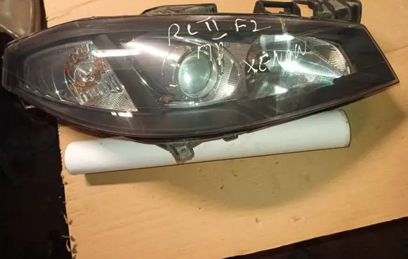 Renault Laguna II Headlight/headlamp 89900794