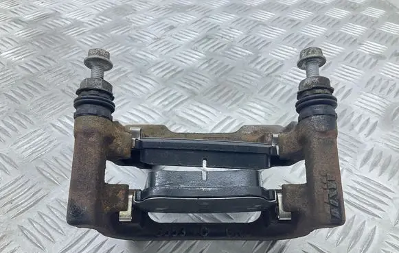 Audi Q3 8U Brake caliper pad carrier rear 5553C
