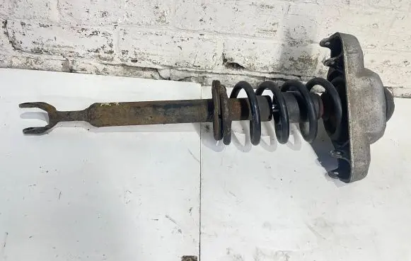 Audi A6 S6 C6 4F Front shock absorber with coil spring