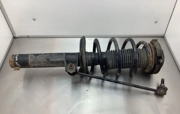 Volkswagen Touran II Front shock absorber with coil spring 