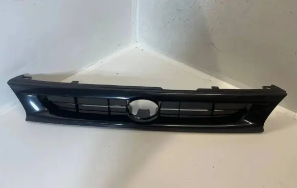 Toyota Corolla E100 Front bumper upper radiator grill TY0822011