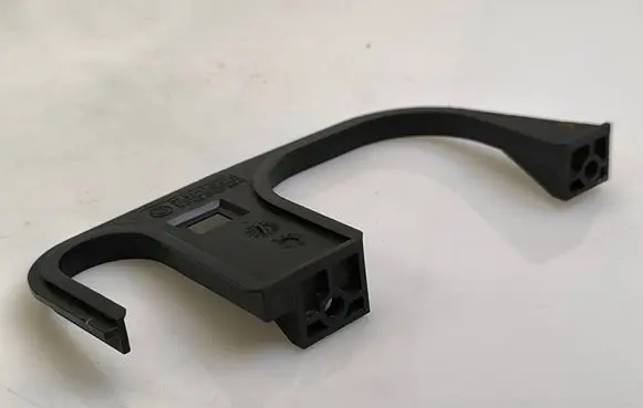 Engine bonnet/hood lock trim molding