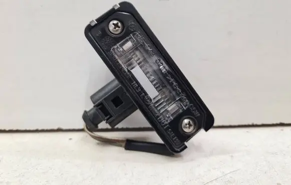 Volkswagen PASSAT B6 Number plate light 1J6943021B