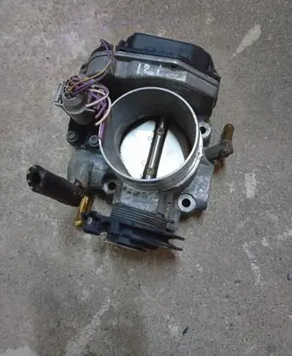 Volkswagen Golf IV Throttle valve 06A133064H