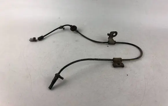Subaru Legacy ABS brake wheel speed sensor 27540AG11