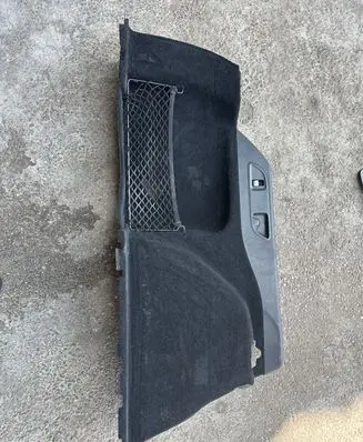Trunk/boot lower side trim panel