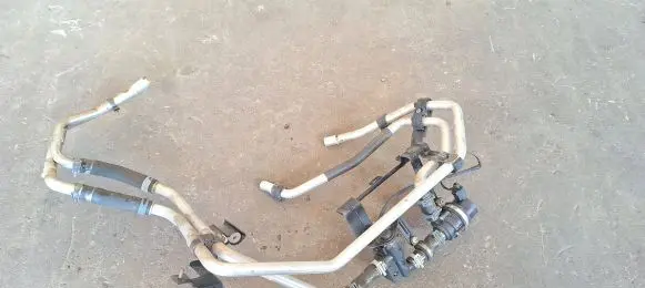 Volkswagen Touareg II Engine coolant pipe/hose 7P0819925C 7L0965561L