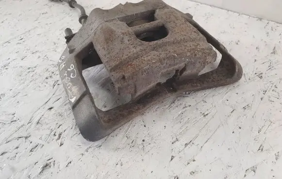 Audi A6 S6 C6 4F Front brake caliper 973