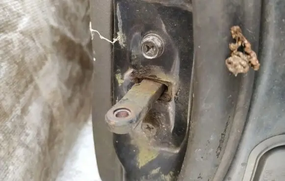 Mitsubishi Colt Front door check strap stopper 