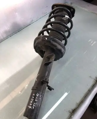 Volvo XC40 Front shock absorber with coil spring 32246637
