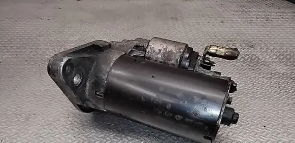 Volkswagen Touran I Starter motor 0001123012 02E911023