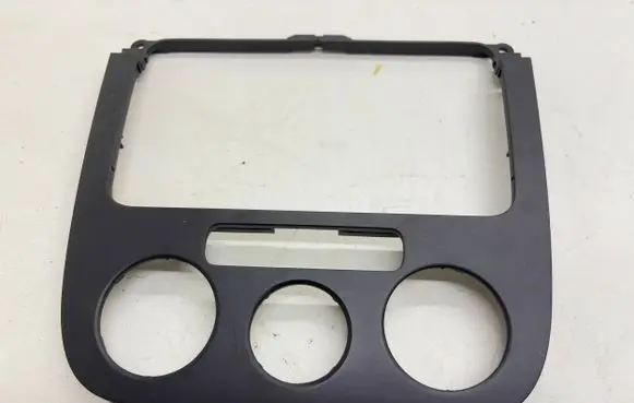 Volkswagen Jetta V Radio/GPS head unit trim 1K0858069F