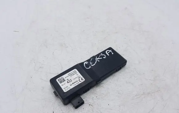 Opel Corsa D Door central lock control unit/module 13503204