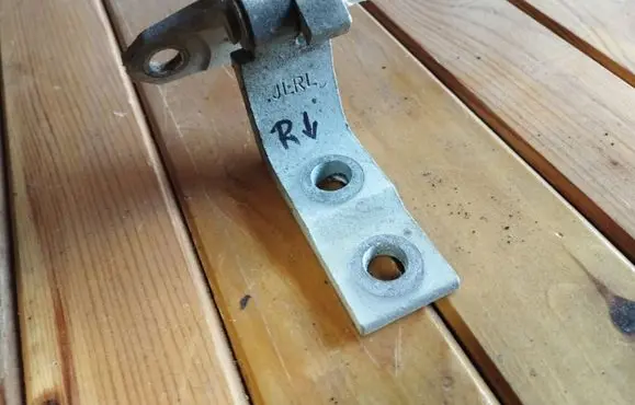 Infiniti G37 Front door lower hinge 
