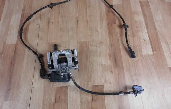 Hyundai Tucson IV NX4 Rear brake caliper 58230N7600