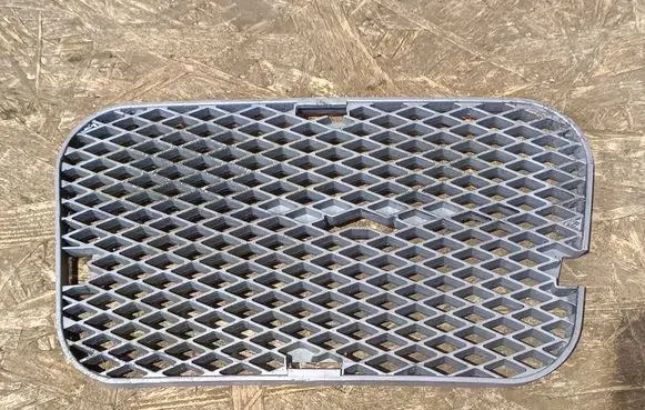 Suzuki Jimny Front fog light trim/grill 7171584A0