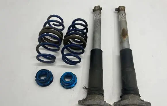 Volkswagen Golf VII Rear shock absorber with coil spring 