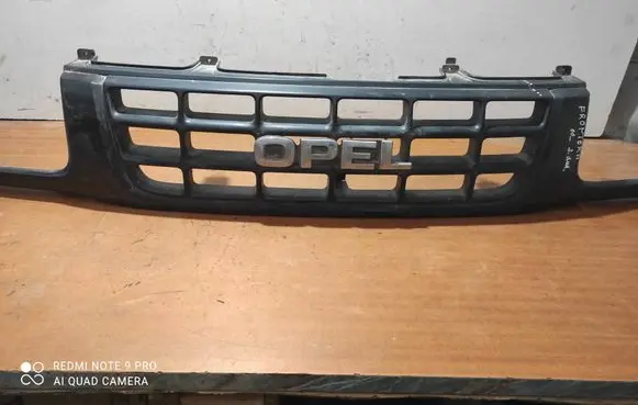 Opel Frontera B Front bumper upper radiator grill 89714451200