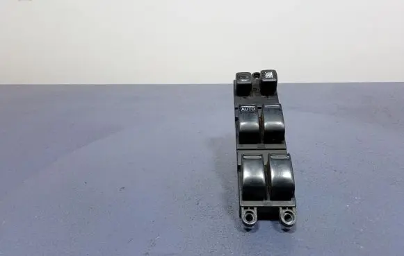 Nissan Primera Electric window control switch 25401AV640