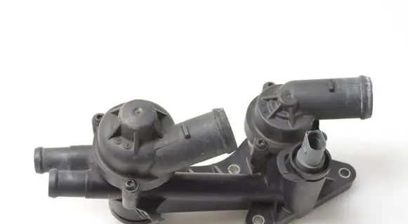 Volkswagen Golf VI Thermostat/thermostat housing 03C121026AC