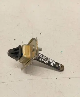 Front door check strap stopper