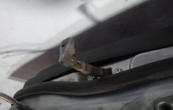 Mitsubishi Lancer X Rear door check strap stopper
