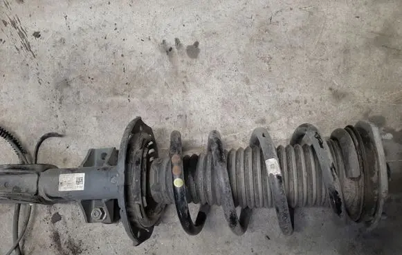 Front shock absorber with coil spring