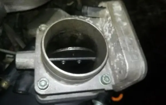 Volkswagen Golf IV Throttle valve 038128063A