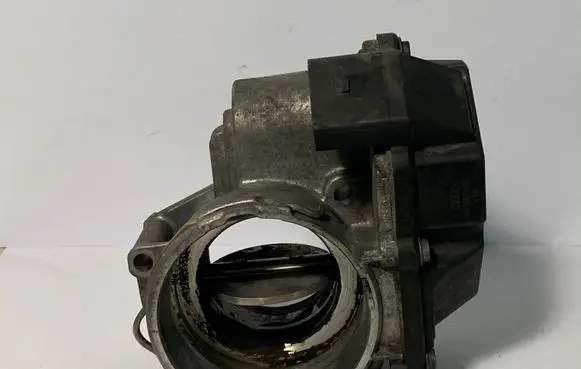 Volkswagen Touran I Throttle valve 03G128063G A2C53249824