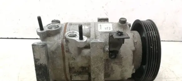 KIA Sportage Air conditioning (A/C) compressor (pump) 97701D7100