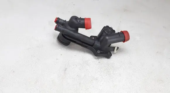 Thermostat/thermostat housing