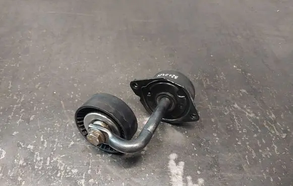 BMW 3 E46 Air conditioning tensioner 7787371 64557787371
