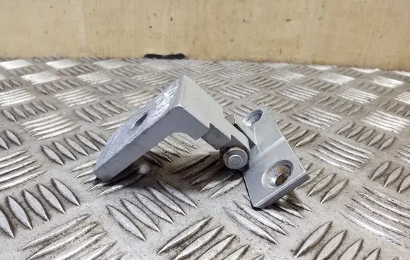 Front door lower hinge