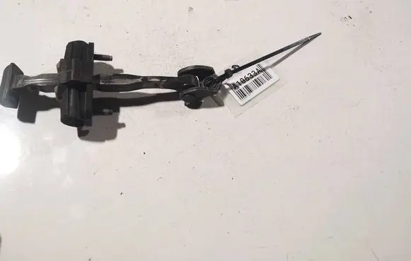 Front door check strap stopper
