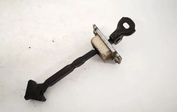 Front door check strap stopper