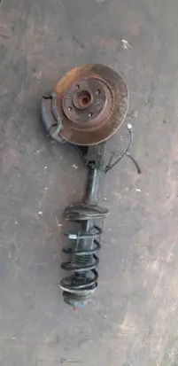 Dacia Logan II Front shock absorber with coil spring 