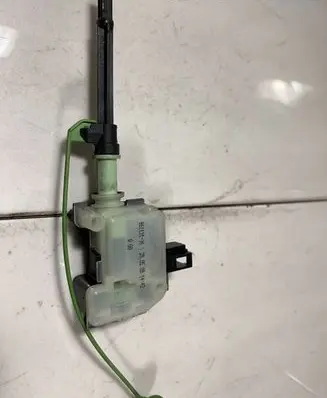 Fuel tank cap lock motor