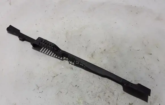 Engine bonnet/hood lock trim molding